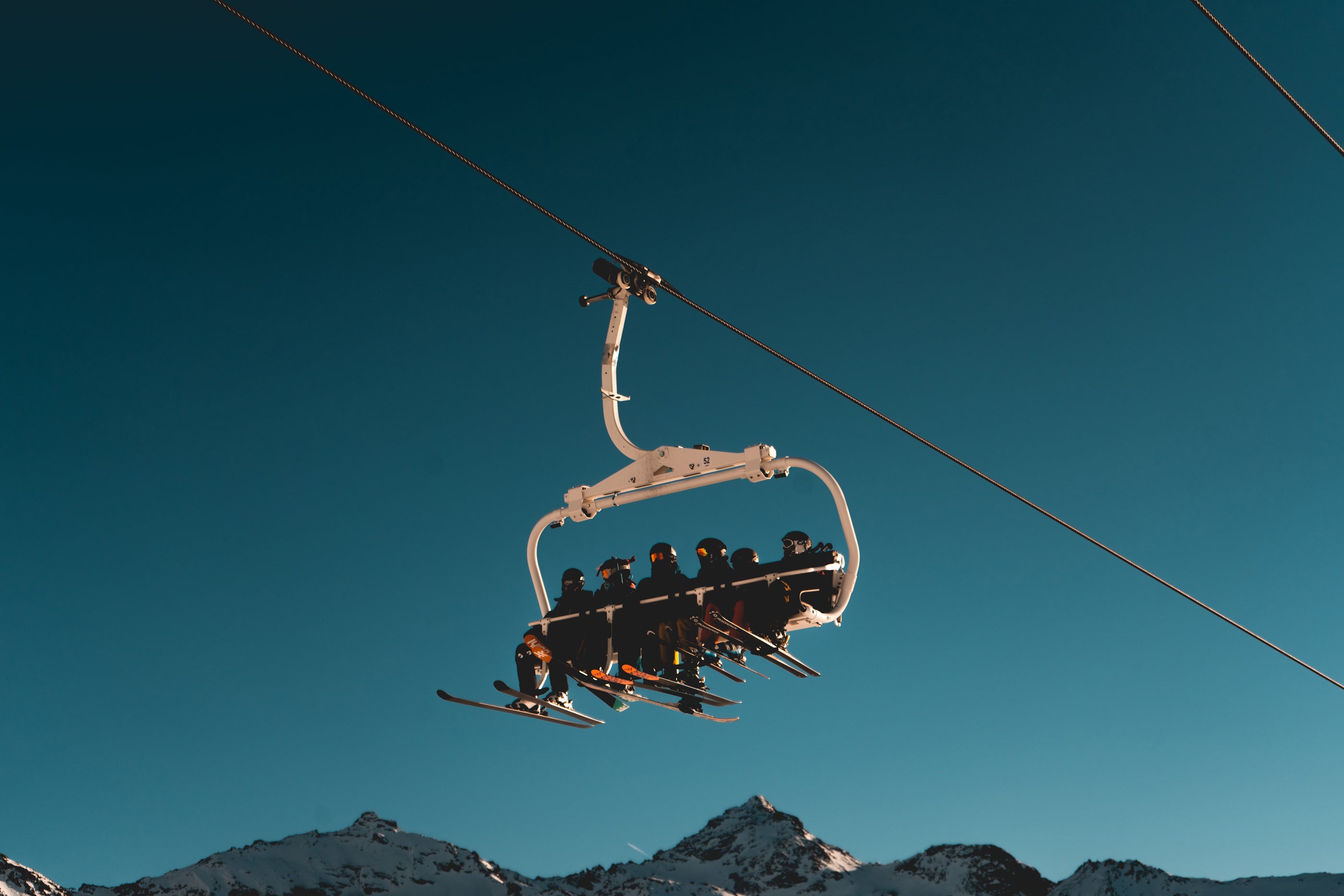 ski chair lift and dark blue sky