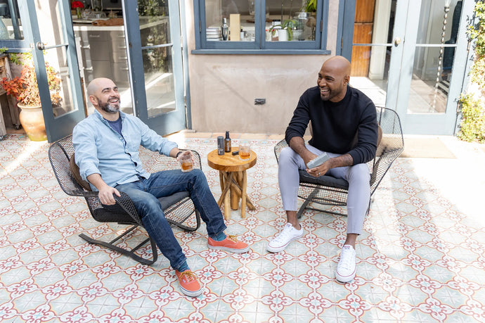 MANTL Co-Founders Karamo Brown and Peter Ricci sitting outside